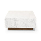 A white Carrara marble slab, rich with veining and movement. Supported by a wooden plinth, marble takes the spotlight in a design that's simple and sophisticated at once.Collection: Hughe Amethyst Home provides interior design, new home construction design consulting, vintage area rugs, and lighting in the Kansas City metro area.