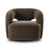 Featuring Mazie Monte Olive Swivel Chair by Four Hands at Amethyst Home. A fluid play on seating. This statement-making swivel chair features subtle cutouts on the back, with plush arms that hug the seat. Upholstered in an olive faux wool-mohair, bringing a plush moment to a classic frame.Overall Dimensions: 36.00"w x 32.00"d x 28.50"hWeight : 71.65 lbsMateria. Amethyst Home provides interior design, new home construction design consulting, vintage area rugs, and lighting in the Austin metro area.