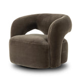 Featuring Mazie Monte Olive Swivel Chair by Four Hands at Amethyst Home. A fluid play on seating. This statement-making swivel chair features subtle cutouts on the back, with plush arms that hug the seat. Upholstered in an olive faux wool-mohair, bringing a plush moment to a classic frame.Overall Dimensions: 36.00"w x 32.00"d x 28.50"hWeight : 71.65 lbsMaterial. Amethyst Home provides interior design, new home construction design consulting, vintage area rugs, and lighting in the Omaha metro area.