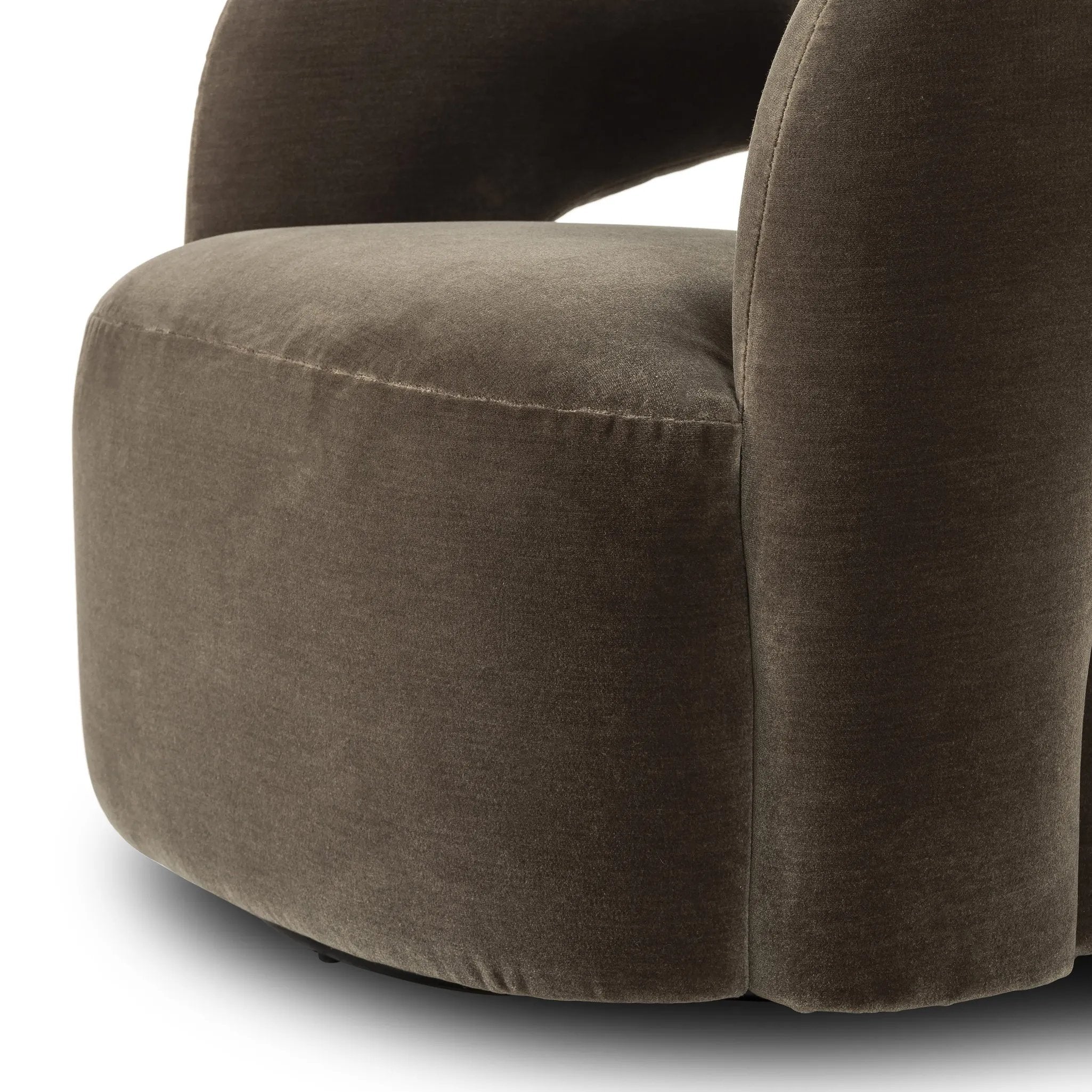 Featuring Mazie Monte Olive Swivel Chair by Four Hands at Amethyst Home. A fluid play on seating. This statement-making swivel chair features subtle cutouts on the back, with plush arms that hug the seat. Upholstered in an olive faux wool-mohair, bringing a plush moment to a classic frame.Overall Dimensions: 36.00"w x 32.00"d x 28.50"hWeight : 71.65 lbs. Amethyst Home provides interior design, new home construction design consulting, vintage area rugs, and lighting in the Winter Garden metro area.