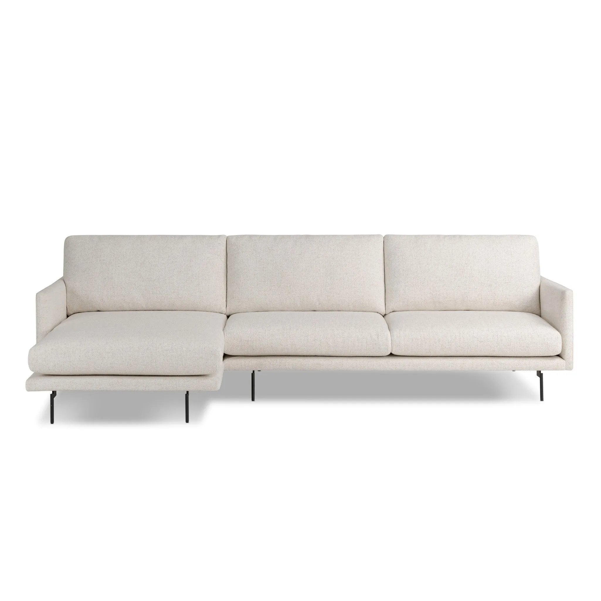 Featuring Melle Omari Natural 2-Piece Sectional by Four Hands at Amethyst Home. A minimalist form to redefine the contemporary sectional. Made from light, neutral high-performance with a slim profile, expert tailoring and plush cushions for comfort. Sleek metal legs and compact sizing make this piece a versatile anchor for smaller living spaces. Performance f. Amethyst Home provides interior design, new home construction design consulting, vintage area rugs, and lighting in the Houston metro area.