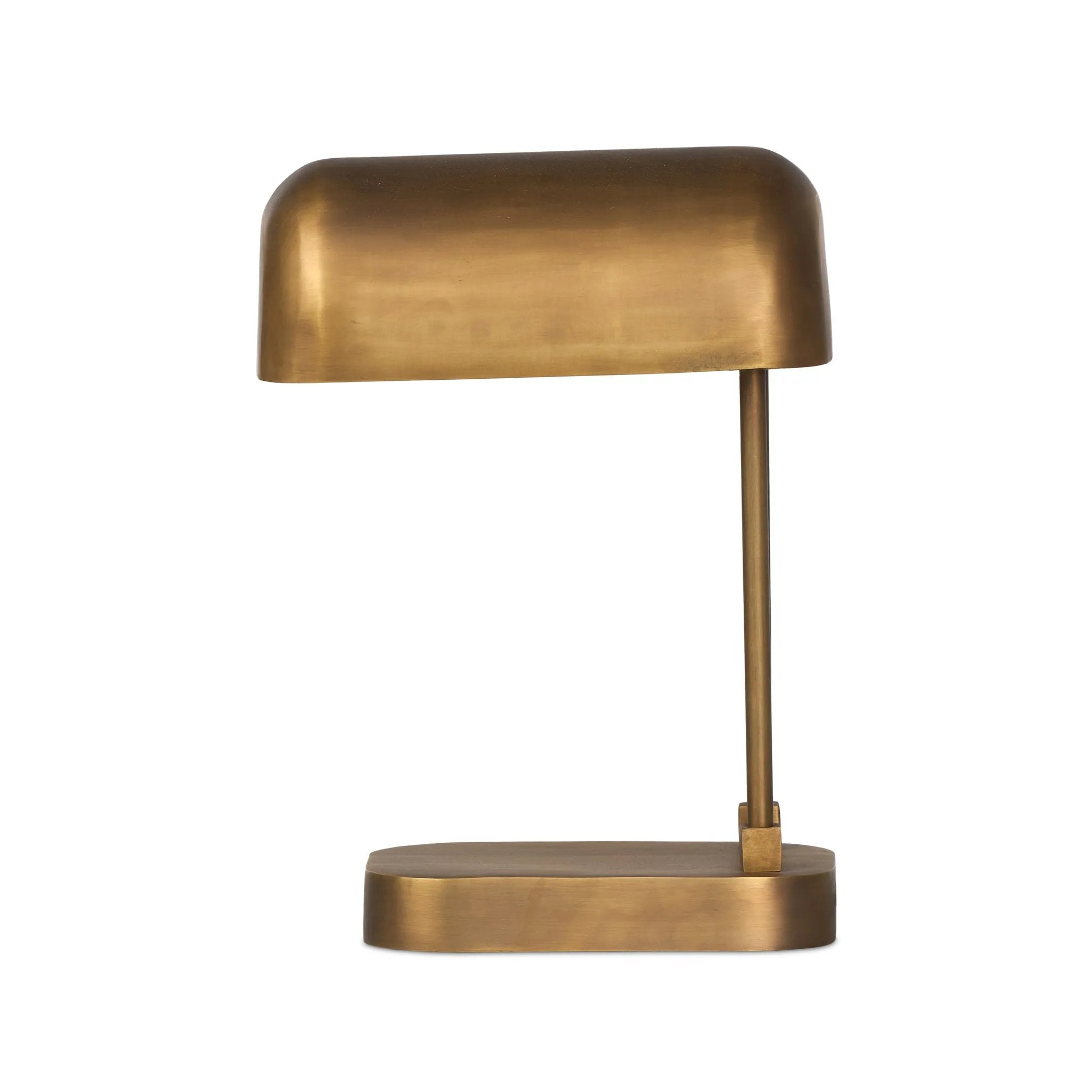 A library task light brings focused illumination to your workspace, nightstand or end table. Crafted from brass with an aged antique finish, the lamp has a rotary switch on the base and double post arms to hold the metal shade in place Amethyst Home provides interior design, new home construction design consulting, vintage area rugs, and lighting in the Tampa metro area.