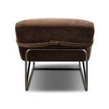 Contoured for comfort, this minimalist chaise is fixed with ideal ergonomics so you can simply sit back and unwind. Inspired by 1960s European design, the chaise blends a utilitarian aesthetic with high-quality tufting, stainless-steel framing, and smooth upholstery. The adjustable headrest is secured by a metal closure and magnetic strip. Amethyst Home provides interior design, new home construction design consulting, vintage area rugs, and lighting in the Boston metro area.