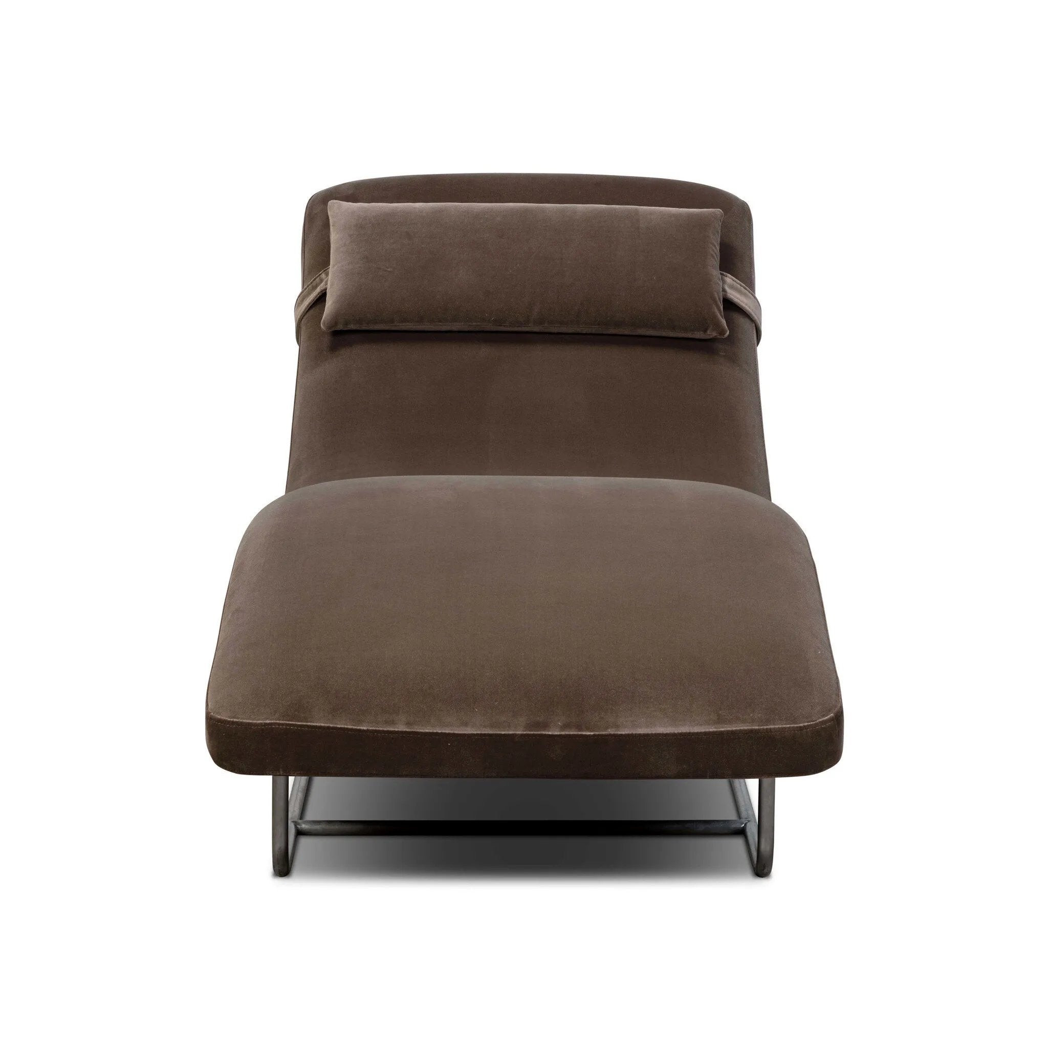 Contoured for comfort, this minimalist chaise is fixed with ideal ergonomics so you can simply sit back and unwind. Inspired by 1960s European design, the chaise blends a utilitarian aesthetic with high-quality tufting, stainless-steel framing, and smooth upholstery. The adjustable headrest is secured by a metal closure and magnetic strip. Amethyst Home provides interior design, new home construction design consulting, vintage area rugs, and lighting in the Houston metro area.