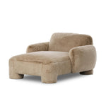 Oversized and modern, this billowy chaise is a statement piece whether styled alone or with an existing living room setup. The cream basketweave covering subdues bold arms and cylindrical legs. With spring suspension in the seat cushion and webbed suspension in the back, the piece is designed with durability and comfort in mind. Amethyst Home provides interior design, new home construction design consulting, vintage area rugs, and lighting in the Alpharetta metro area.