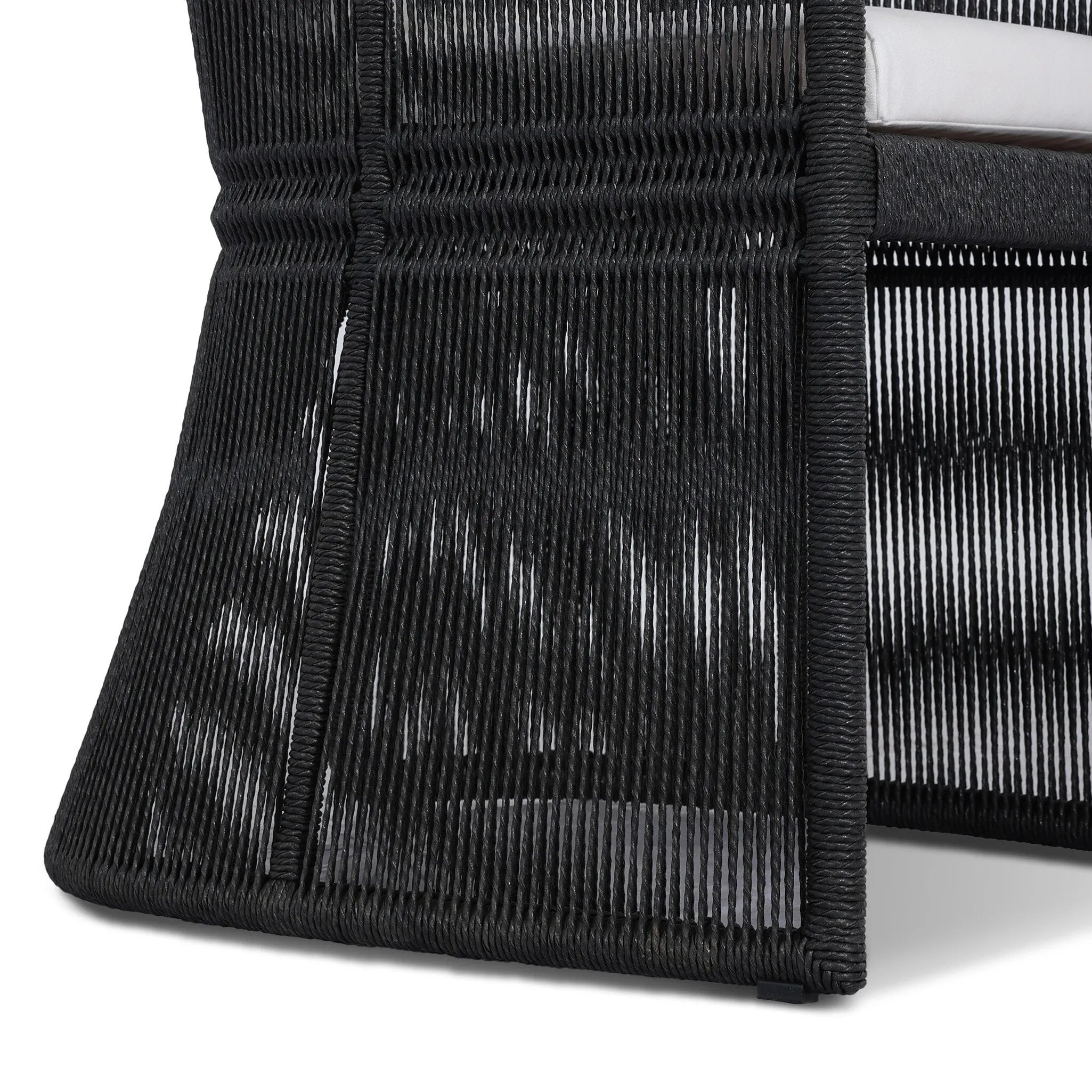 Featuring Mondira Arashi Salt Outdoor Dining Chair by Four Hands at Amethyst Home. A stunning spot for outdoor daydreaming. The linear rope-based design on this beautifully woven outdoor dining chair is paired with clean curves. Designed with an angular cutout detail on back so the seat is stunning from all angles. Back and seat cushions are UV-resistant, w. Amethyst Home provides interior design, new home construction design consulting, vintage area rugs, and lighting in the Park City metro area.