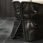 Featuring Mondira Arashi Salt Outdoor Dining Chair by Four Hands at Amethyst Home. A stunning spot for outdoor daydreaming. The linear rope-based design on this beautifully woven outdoor dining chair is paired with clean curves. Designed with an angular cutout detail on back so the seat is stunning from all angles. Back and seat cushions are UV-resistant, wa. Amethyst Home provides interior design, new home construction design consulting, vintage area rugs, and lighting in the Portland metro area.