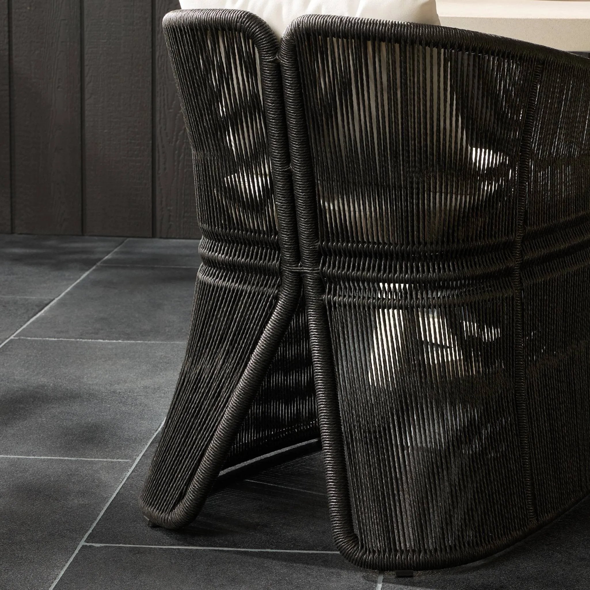 Featuring Mondira Arashi Salt Outdoor Dining Chair by Four Hands at Amethyst Home. A stunning spot for outdoor daydreaming. The linear rope-based design on this beautifully woven outdoor dining chair is paired with clean curves. Designed with an angular cutout detail on back so the seat is stunning from all angles. Back and seat cushions are UV-resistant, wa. Amethyst Home provides interior design, new home construction design consulting, vintage area rugs, and lighting in the Portland metro area.