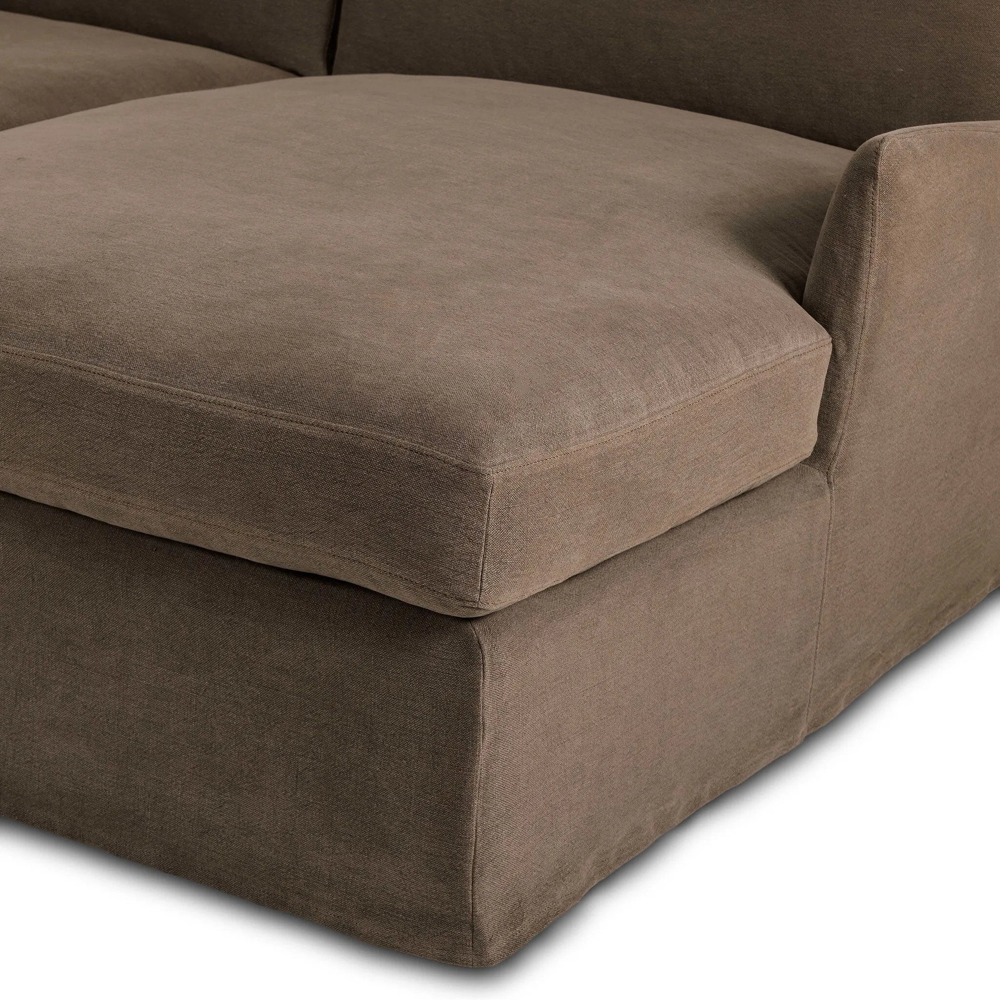 This two-piece sectional is defined by slightly sloping, flared arms and a floor-length slipcover. Finished in a soft, tight weave slipcover for a traditional style. Durable and soft to the touch, Libeco™-sourced linens are artisan-made and free of toxic chemicals. Slipcovered styles are fully removable and machine-washable for easy care Amethyst Home provides interior design, new home construction design consulting, vintage area rugs, and lighting in the Monterey metro area.