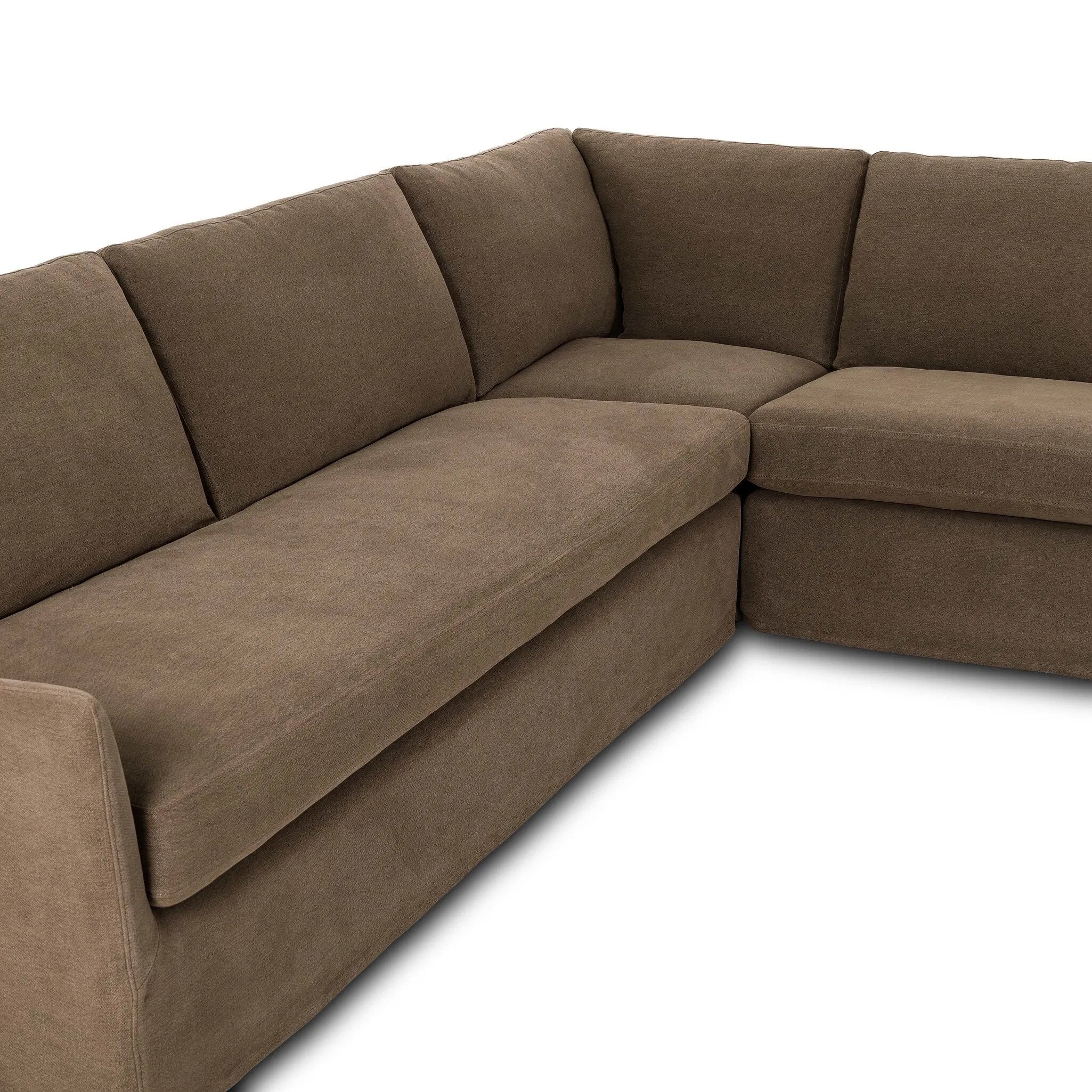 This three-piece sectional is defined by slightly sloping, flared arms and a floor-length slipcover. Finished in a soft, tight weave slipcover for a traditional style. Durable and soft to the touch, Libeco™-sourced linens are artisan-made and free of toxic chemicals. Slipcovered styles are fully removable and machine-washable for easy care Amethyst Home provides interior design, new home construction design consulting, vintage area rugs, and lighting in the Calabasas metro area.