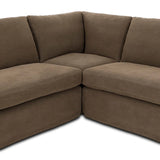This three-piece sectional is defined by slightly sloping, flared arms and a floor-length slipcover. Finished in a soft, tight weave slipcover for a traditional style. Durable and soft to the touch, Libeco™-sourced linens are artisan-made and free of toxic chemicals. Slipcovered styles are fully removable and machine-washable for easy care Amethyst Home provides interior design, new home construction design consulting, vintage area rugs, and lighting in the Seattle metro area.