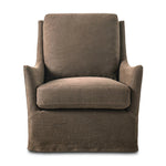 This relaxing glider chair is defined by slightly sloping, flared arms and a floor-length slipcover that's finished in a soft, tight weave for a traditional style Amethyst Home provides interior design, new home construction design consulting, vintage area rugs, and lighting in the Newport Beach metro area.