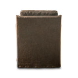 This relaxing glider chair is defined by slightly sloping, flared arms and a floor-length slipcover that's finished in a soft, tight weave for a traditional style Amethyst Home provides interior design, new home construction design consulting, vintage area rugs, and lighting in the Winter Garden metro area.