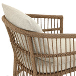 Cottage-inspired, faux hyacinth mimics its natural counterpart, with joint wrapping and texture for depth and character defining this outdoor dining chair. Varied proportion for dimension. Upholstered in a UV-resistant, water-repellent, quick-drying fabric. Cover or store indoors during inclement weather and when not in use Amethyst Home provides interior design, new home construction design consulting, vintage area rugs, and lighting in the Charlotte metro area.