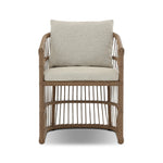 Cottage-inspired, faux hyacinth mimics its natural counterpart, with joint wrapping and texture for depth and character defining this outdoor dining chair. Varied proportion for dimension. Upholstered in a UV-resistant, water-repellent, quick-drying fabric. Cover or store indoors during inclement weather and when not in use Amethyst Home provides interior design, new home construction design consulting, vintage area rugs, and lighting in the Houston metro area.