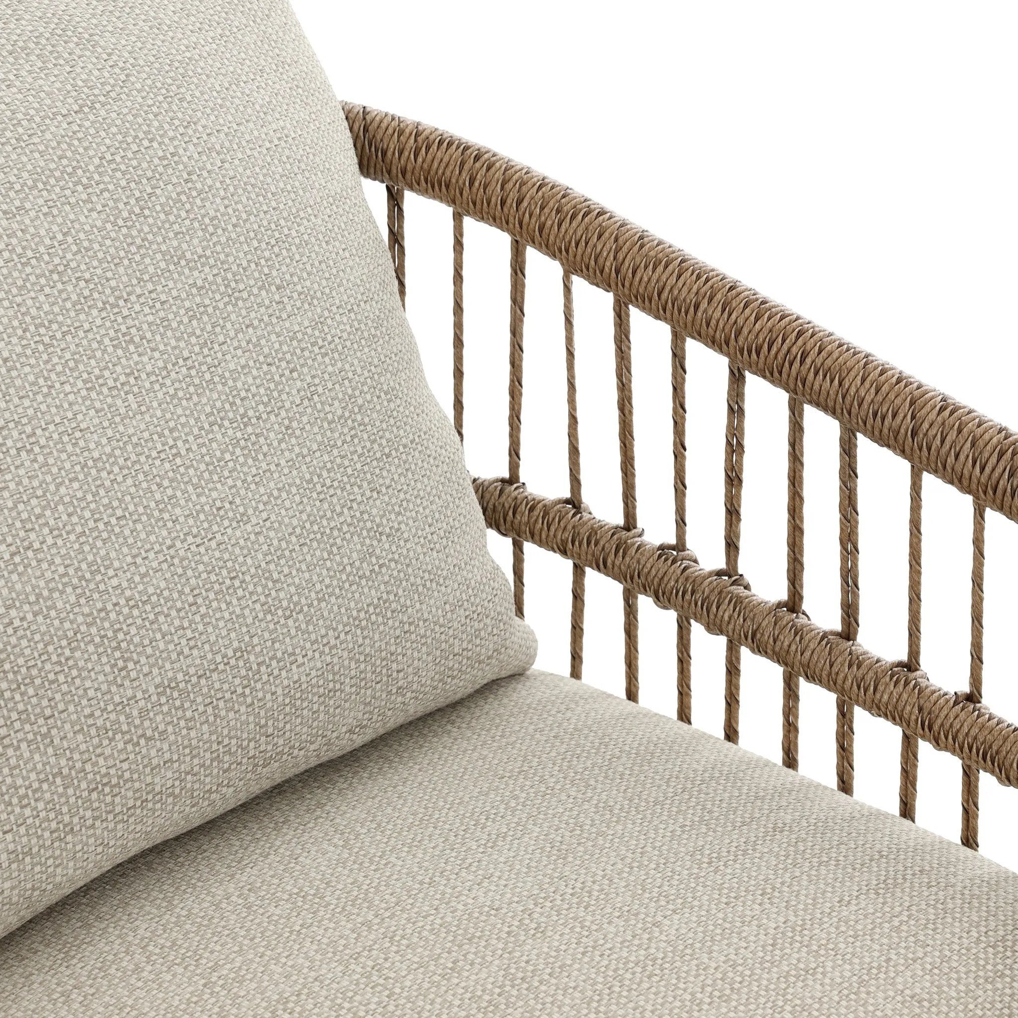 Cottage-inspired, faux hyacinth mimics its natural counterpart, with joint wrapping and texture for depth and character defining this outdoor dining chair. Varied proportion for dimension. Upholstered in a UV-resistant, water-repellent, quick-drying fabric. Cover or store indoors during inclement weather and when not in use Amethyst Home provides interior design, new home construction design consulting, vintage area rugs, and lighting in the Miami metro area.