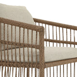 Cottage-inspired, faux hyacinth mimics its natural counterpart, with joint wrapping and texture for depth and character defining this outdoor dining chair. Varied proportion for dimension. Upholstered in a UV-resistant, water-repellent, quick-drying fabric. Cover or store indoors during inclement weather and when not in use Amethyst Home provides interior design, new home construction design consulting, vintage area rugs, and lighting in the Park City metro area.