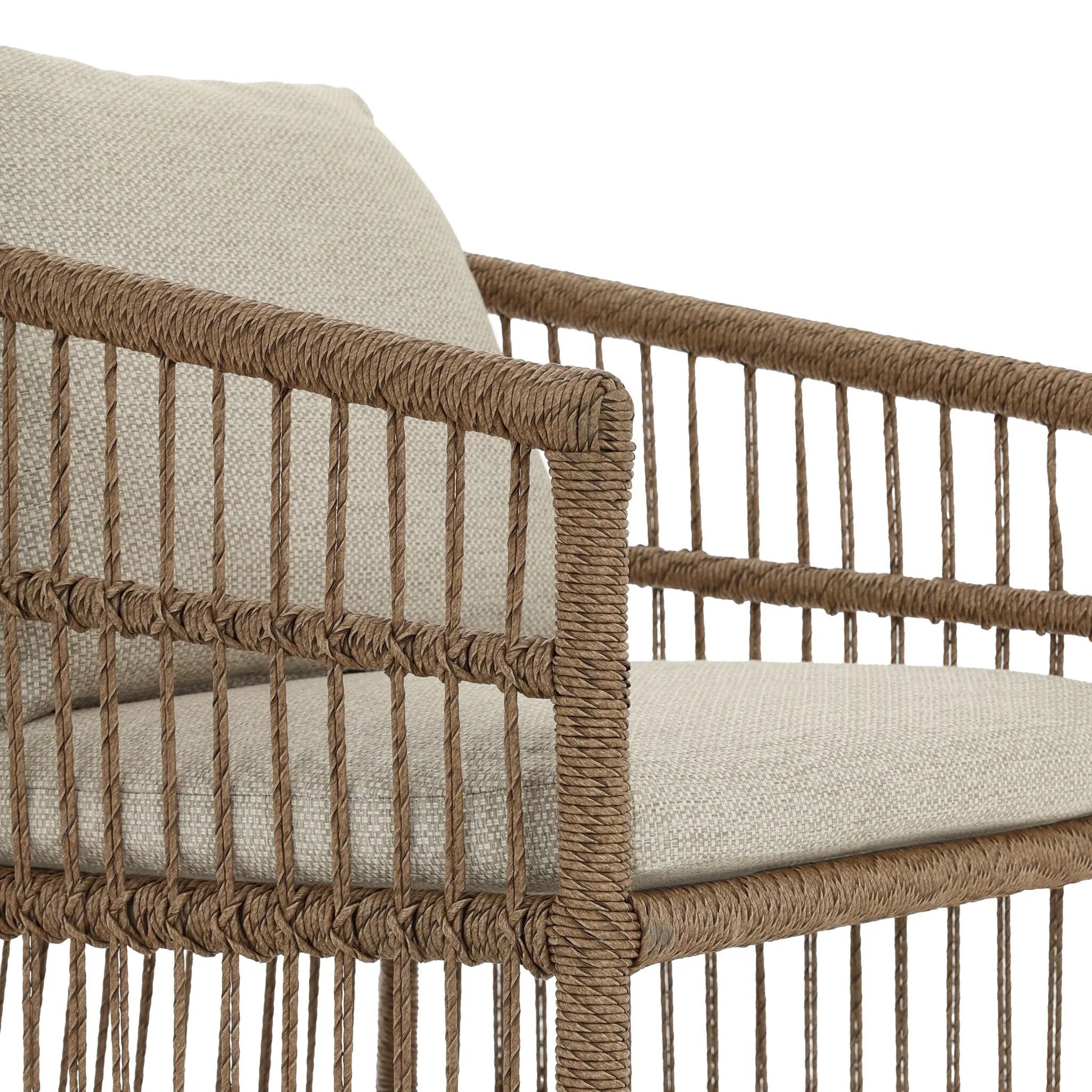 Cottage-inspired, faux hyacinth mimics its natural counterpart, with joint wrapping and texture for depth and character defining this outdoor dining chair. Varied proportion for dimension. Upholstered in a UV-resistant, water-repellent, quick-drying fabric. Cover or store indoors during inclement weather and when not in use Amethyst Home provides interior design, new home construction design consulting, vintage area rugs, and lighting in the Park City metro area.