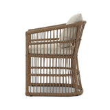 Cottage-inspired, faux hyacinth mimics its natural counterpart, with joint wrapping and texture for depth and character defining this outdoor dining chair. Varied proportion for dimension. Upholstered in a UV-resistant, water-repellent, quick-drying fabric. Cover or store indoors during inclement weather and when not in use Amethyst Home provides interior design, new home construction design consulting, vintage area rugs, and lighting in the Scottsdale metro area.