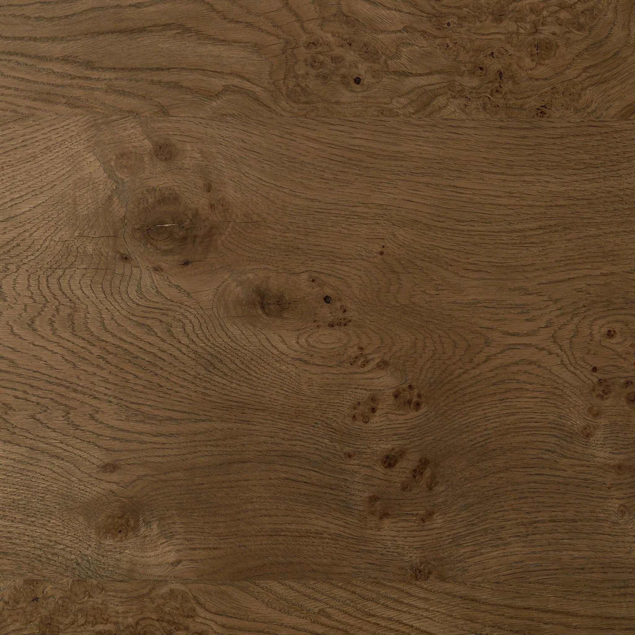 This monolithic piece features a grand plinth base, subtly rounded corners and bullnose edges. A mix of solid oak and oak veneer offers the best of both worlds: beautiful movement from the natural oak graining and added character from the burl veneer finish. Amethyst Home provides interior design, new home construction design consulting, vintage area rugs, and lighting in the Boston metro area.