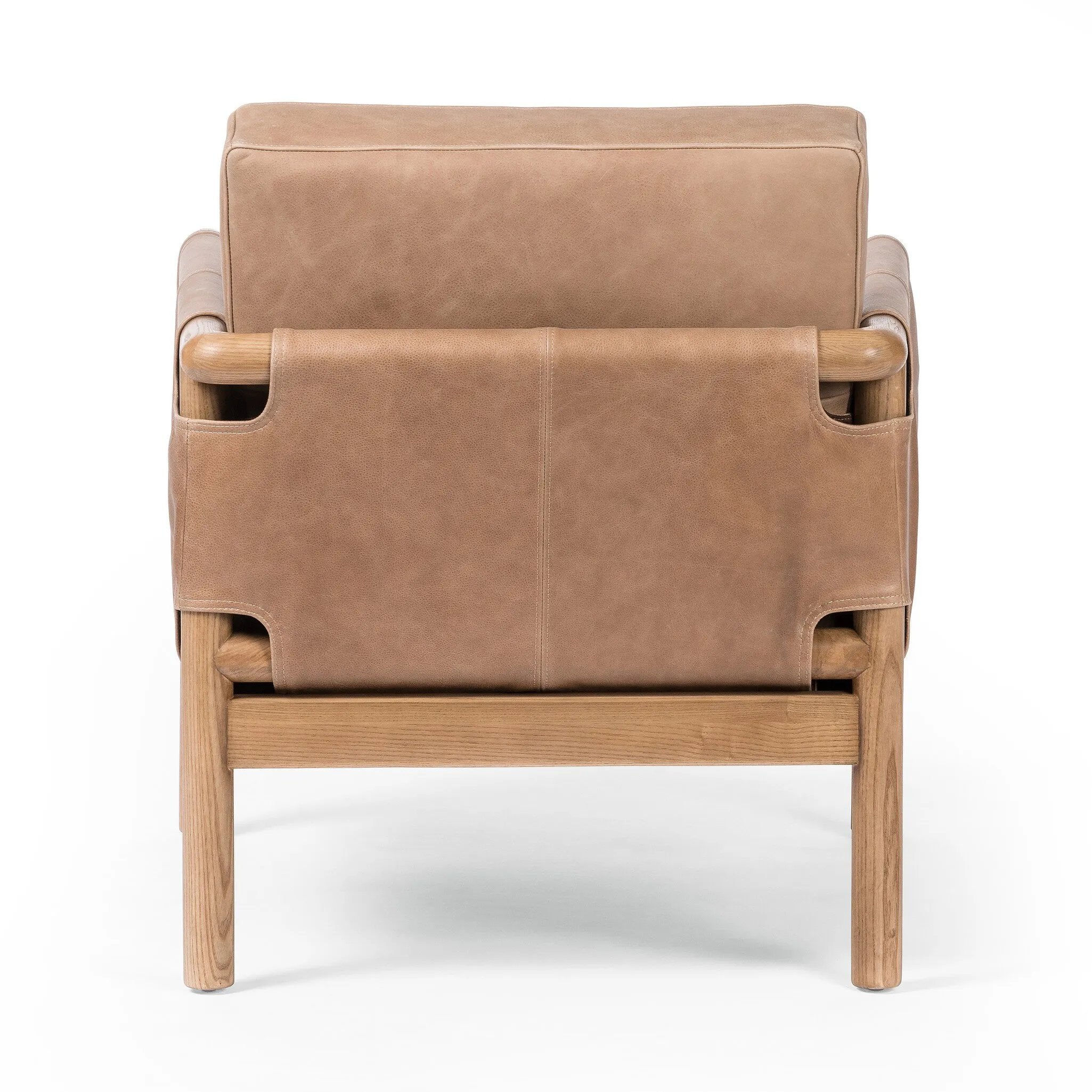 Featuring Navarro Palermo Drift Chair by Four Hands at Amethyst Home. Safari inspiration meets zen aspirations. A cylindrical frame is crafted, smoothed and rounded from solid ash wood. Includes two loose feather-blend cushions covered in subtly distressed thick cut leather in a neutral taupe hue for a monochromatic look. Overall Dimensions: 27.75"w x 34.00"d . Amethyst Home provides interior design, new home construction design consulting, vintage area rugs, and lighting in the Dallas metro area.