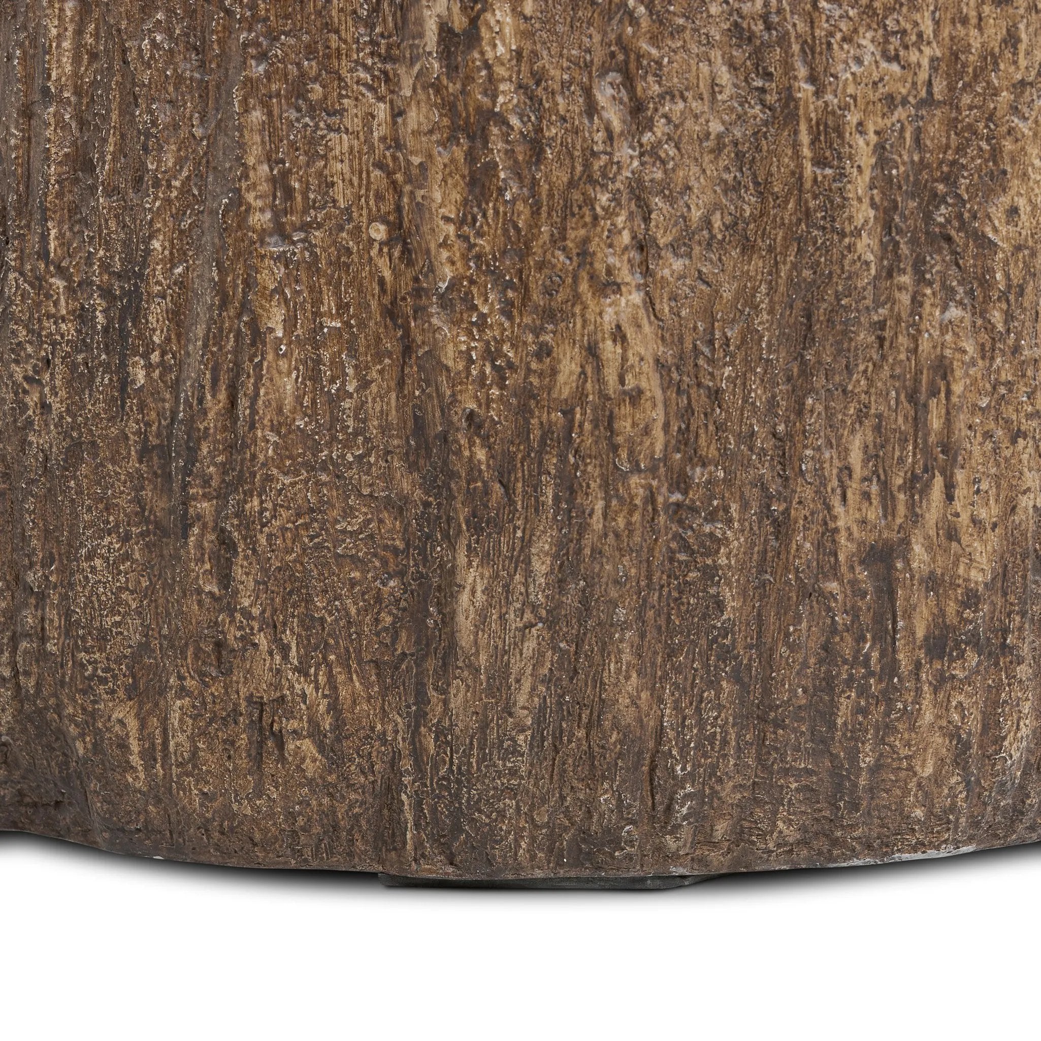 Bring nature inside with a drum-style end table of solid concrete that's been textured to resemble a tree trunk. A smooth, high-polish top balances a heavily textured bottom, and is perfectly sized to keep your favorite book or drink within reach Amethyst Home provides interior design, new home construction design consulting, vintage area rugs, and lighting in the San Diego metro area.