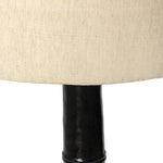 Inspired by a vintage salt shaker found while exploring Copenhagen, Denmark, this glossy cast aluminum lamp has a telescoping shape that's finished with a traditional flax linen shade Amethyst Home provides interior design, new home construction design consulting, vintage area rugs, and lighting in the Dallas metro area.