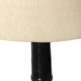 Inspired by a vintage salt shaker found while exploring Copenhagen, Denmark, this glossy cast aluminum lamp has a telescoping shape that's finished with a traditional flax linen shade Amethyst Home provides interior design, new home construction design consulting, vintage area rugs, and lighting in the Dallas metro area.