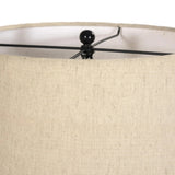 Inspired by a vintage salt shaker found while exploring Copenhagen, Denmark, this glossy cast aluminum lamp has a telescoping shape that's finished with a traditional flax linen shade Amethyst Home provides interior design, new home construction design consulting, vintage area rugs, and lighting in the Miami metro area.