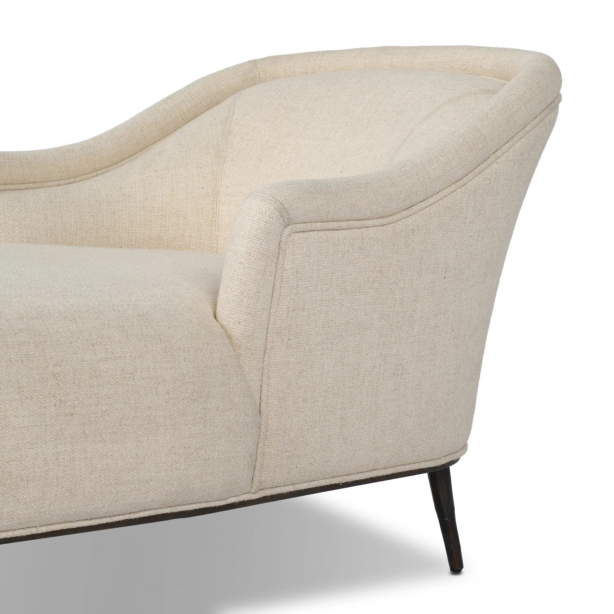 With elements of past eras at play, this updated Deco chaise features a rounded back, sloped arms and a dramatic channel. The iron base and tapered legs support the cushiony seating — built with spring suspensions for long-lasting comfort. Amethyst Home provides interior design, new home construction design consulting, vintage area rugs, and lighting in the Newport Beach metro area.