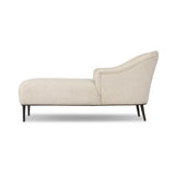 With elements of past eras at play, this updated Deco chaise features a rounded back, sloped arms and a dramatic channel. The iron base and tapered legs support the cushiony seating — built with spring suspensions for long-lasting comfort. Amethyst Home provides interior design, new home construction design consulting, vintage area rugs, and lighting in the Tampa metro area.