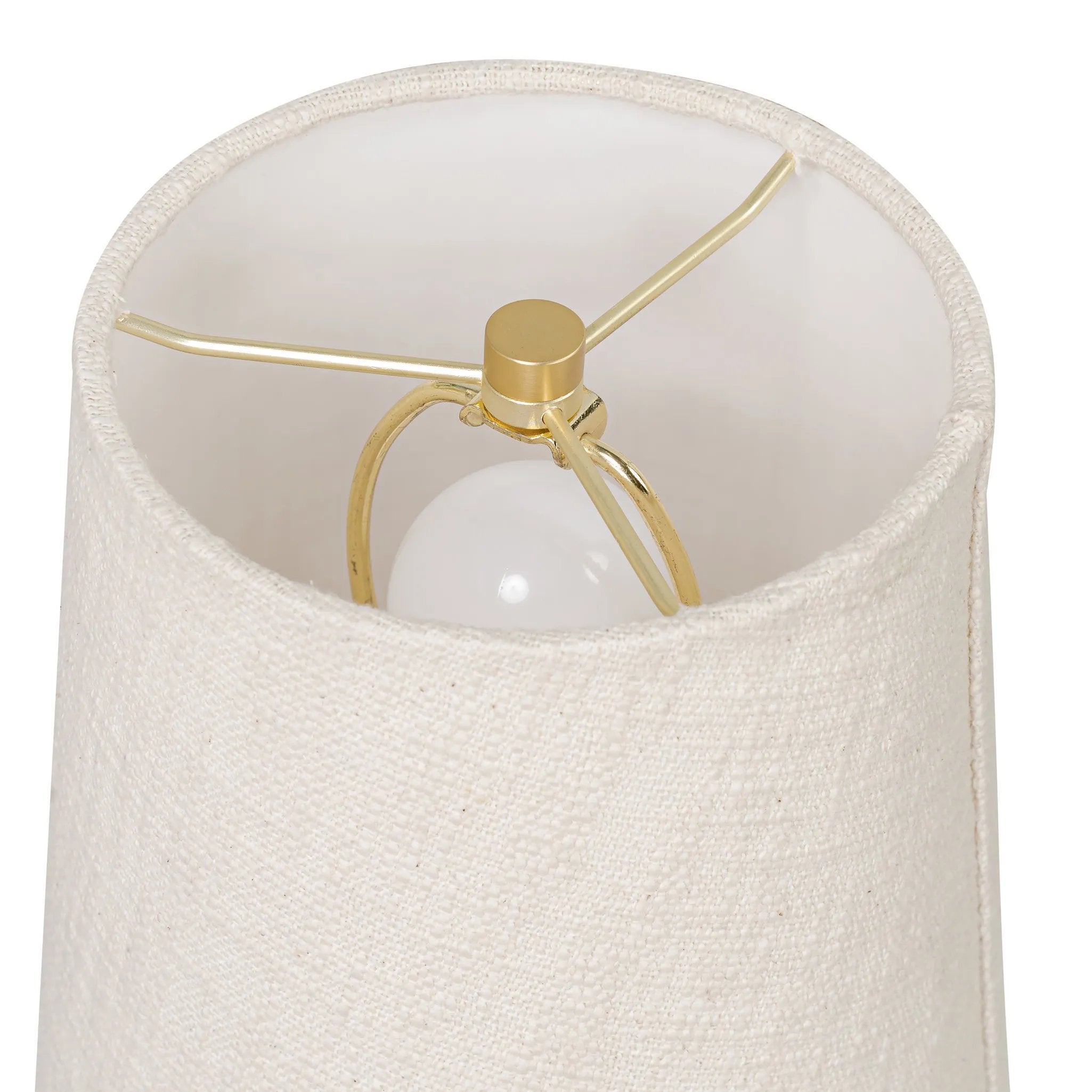 Modern minimal meets traditional. A tapered wood table lamp base is topped with a design-forward boucle linen shade Amethyst Home provides interior design, new home construction design consulting, vintage area rugs, and lighting in the Calabasas metro area.