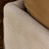 An arched headboard and simple frame act as the perfect canvas for your favorite bedding. A soft textural linen slipcover in a neutral hue contributes a cozy yet refined look Amethyst Home provides interior design, new home construction design consulting, vintage area rugs, and lighting in the Los Angeles metro area.