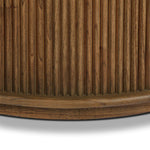 An artisanal take on texture. Made from amber-finished mindi with a plinth-style base, a reeding pattern is carved around the entirety of this coffee table table for a fresh, approachable look.As lovers of natural aesthetics at Amethyst, we love the warm modern inspired Ona Coffee Table - Amber Mindi Veneer. Amethyst Home provides interior design, new home construction design consulting, vintage area rugs, and lighting in the Monterey metro area.