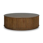 An artisanal take on texture. Made from amber-finished mindi with a plinth-style base, a reeding pattern is carved around the entirety of this coffee table table for a fresh, approachable look.As lovers of natural aesthetics at Amethyst, we love the warm modern inspired Ona Coffee Table - Amber Mindi Veneer. Amethyst Home provides interior design, new home construction design consulting, vintage area rugs, and lighting in the Omaha metro area.