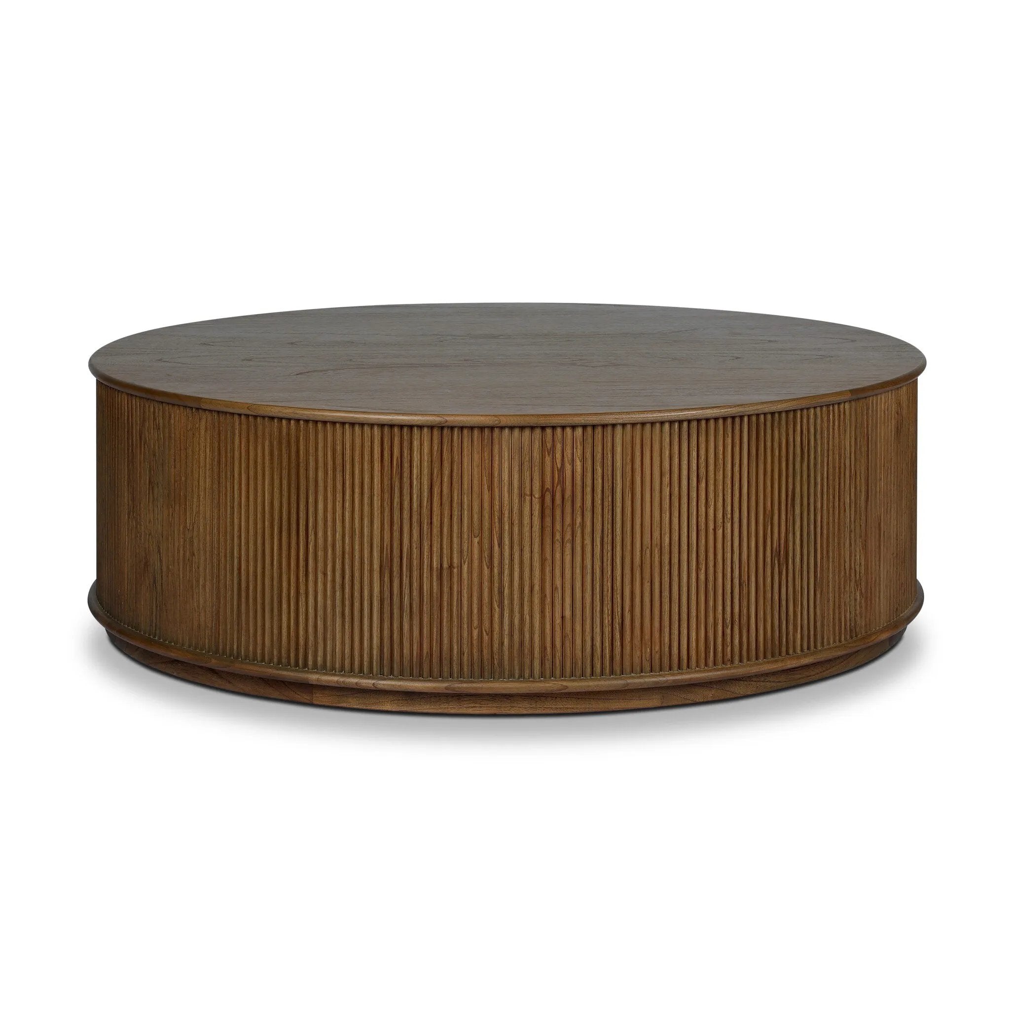 An artisanal take on texture. Made from amber-finished mindi with a plinth-style base, a reeding pattern is carved around the entirety of this coffee table table for a fresh, approachable look.As lovers of natural aesthetics at Amethyst, we love the warm modern inspired Ona Coffee Table - Amber Mindi Veneer. Amethyst Home provides interior design, new home construction design consulting, vintage area rugs, and lighting in the Omaha metro area.
