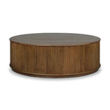 An artisanal take on texture. Made from amber-finished mindi with a plinth-style base, a reeding pattern is carved around the entirety of this coffee table table for a fresh, approachable look.As lovers of natural aesthetics at Amethyst, we love the warm modern inspired Ona Coffee Table - Amber Mindi Veneer. Amethyst Home provides interior design, new home construction design consulting, vintage area rugs, and lighting in the Portland metro area.