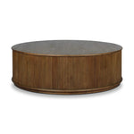An artisanal take on texture. Made from amber-finished mindi with a plinth-style base, a reeding pattern is carved around the entirety of this coffee table table for a fresh, approachable look.As lovers of natural aesthetics at Amethyst, we love the warm modern inspired Ona Coffee Table - Amber Mindi Veneer. Amethyst Home provides interior design, new home construction design consulting, vintage area rugs, and lighting in the Scottsdale metro area.