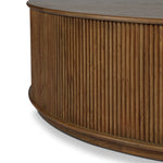 An artisanal take on texture. Made from amber-finished mindi with a plinth-style base, a reeding pattern is carved around the entirety of this coffee table table for a fresh, approachable look.As lovers of natural aesthetics at Amethyst, we love the warm modern inspired Ona Coffee Table - Amber Mindi Veneer. Amethyst Home provides interior design, new home construction design consulting, vintage area rugs, and lighting in the Winter Garden metro area.