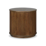 An artisanal take on texture. Made from mindi wood with a plinth-style base, a reeding pattern is carved around the entirety of this versatile end table for a fresh, approachable look.As fans of luxe style at Amethyst, we love the optimistic inspired Ona End Table - Amber Mindi Veneer. Amethyst Home provides interior design, new home construction design consulting, vintage area rugs, and lighting in the Dallas metro area.