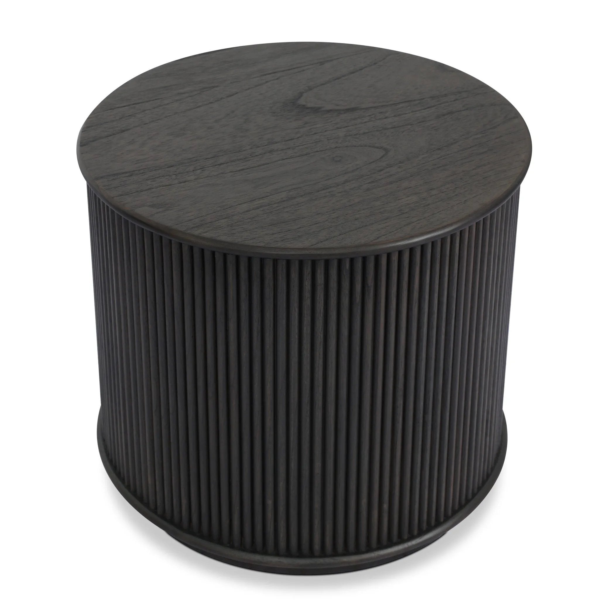 An artisanal take on texture. Made from black-finished mindi wood with a plinth-style base, a reeding pattern is carved around the entirety of this versatile end table for a fresh, approachable look.As lovers of luxe aesthetics at Amethyst, we love the optimistic inspired Ona End Table - Smoked Black Mindi Veneer. Amethyst Home provides interior design, new home construction design consulting, vintage area rugs, and lighting in the Austin metro area.