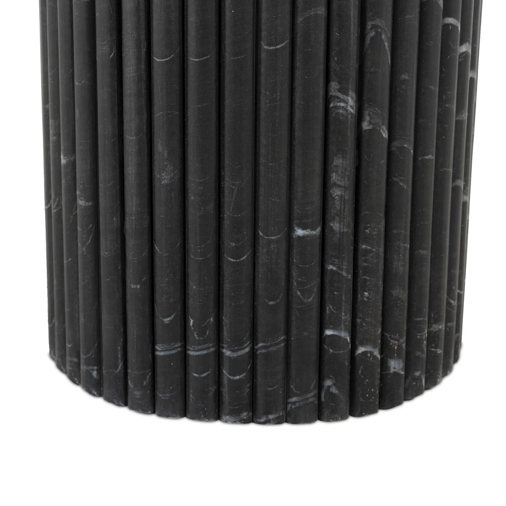 Featuring Oranda Black Marble Round Dining Table by Four Hands at Amethyst Home. Inspired by Italian design, a swirling marble base is scalloped for a linear look with heavy texture, finished with a rounded, bistro-size tabletop of polished black marble.Overall Dimensions: 42.00"w x 42.00"d x 30.00"hWeight : 195.00 lbsMaterials: Solid Marble. Amethyst Home provides interior design, new home construction design consulting, vintage area rugs, and lighting in the Dallas metro area.