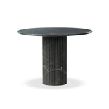 Featuring Oranda Black Marble Round Dining Table by Four Hands at Amethyst Home. Inspired by Italian design, a swirling marble base is scalloped for a linear look with heavy texture, finished with a rounded, bistro-size tabletop of polished black marble.Overall Dimensions: 42.00"w x 42.00"d x 30.00"hWeight : 195.00 lbsMaterials: Solid Marble. Amethyst Home provides interior design, new home construction design consulting, vintage area rugs, and lighting in the Portland metro area.