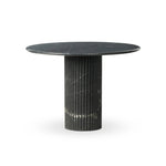 Featuring Oranda Black Marble Round Dining Table by Four Hands at Amethyst Home. Inspired by Italian design, a swirling marble base is scalloped for a linear look with heavy texture, finished with a rounded, bistro-size tabletop of polished black marble.Overall Dimensions: 42.00"w x 42.00"d x 30.00"hWeight : 195.00 lbsMaterials: Solid Marble. Amethyst Home provides interior design, new home construction design consulting, vintage area rugs, and lighting in the Scottsdale metro area.