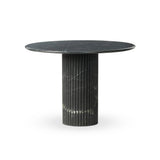 Featuring Oranda Black Marble Round Dining Table by Four Hands at Amethyst Home. Inspired by Italian design, a swirling marble base is scalloped for a linear look with heavy texture, finished with a rounded, bistro-size tabletop of polished black marble.Overall Dimensions: 42.00"w x 42.00"d x 30.00"hWeight : 195.00 lbsMaterials: Solid Marble. Amethyst Home provides interior design, new home construction design consulting, vintage area rugs, and lighting in the Scottsdale metro area.