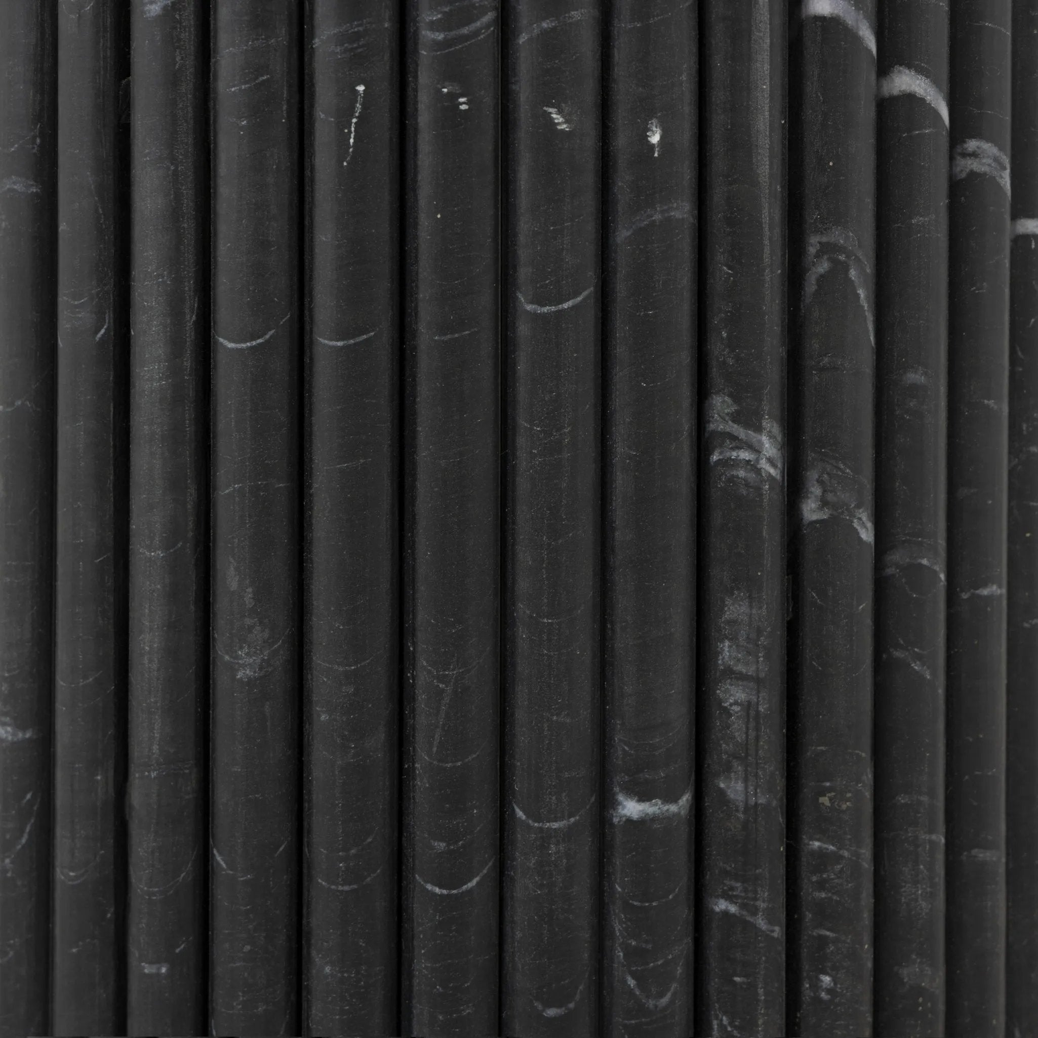 Featuring Oranda Black Marble Round Dining Table by Four Hands at Amethyst Home. Inspired by Italian design, a swirling marble base is scalloped for a linear look with heavy texture, finished with a rounded, bistro-size tabletop of polished black marble.Overall Dimensions: 42.00"w x 42.00"d x 30.00"hWeight : 195.00 lbsMaterials: Solid Marble. Amethyst Home provides interior design, new home construction design consulting, vintage area rugs, and lighting in the Seattle metro area.