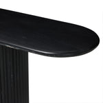 Italian-inspired for effortless sophistication. A black marble base is scalloped for a linear look with heavy texture, finished with a pill-shaped top for extra entryway styling atop this console table.As lovers of organic modern aesthetics at Amethyst, we love the designer inspired Oranda Console Table - Black Marble. Amethyst Home provides interior design, new home construction design consulting, vintage area rugs, and lighting in the Los Angeles metro area.