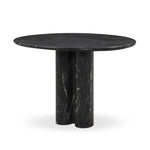 A material-driven piece inspired by post-modernism. A subtly organic round tabletop pairs with a swooped, sculptural pedestal base. Made from black marble for a striking, timeless look, with contrasting white veining playing up this piece's curves.As enthusiasts of luxe aesthetics at Amethyst, we love the designer inspired Oric Bistro Table. Amethyst Home provides interior design, new home construction design consulting, vintage area rugs, and lighting in the Laguna Beach metro area.