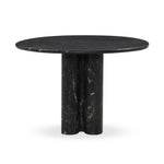 A material-driven piece inspired by post-modernism. A subtly organic round tabletop pairs with a swooped, sculptural pedestal base. Made from black marble for a striking, timeless look, with contrasting white veining playing up this piece's curves.As enthusiasts of luxe aesthetics at Amethyst, we love the designer inspired Oric Bistro Table. Amethyst Home provides interior design, new home construction design consulting, vintage area rugs, and lighting in the Portland metro area.