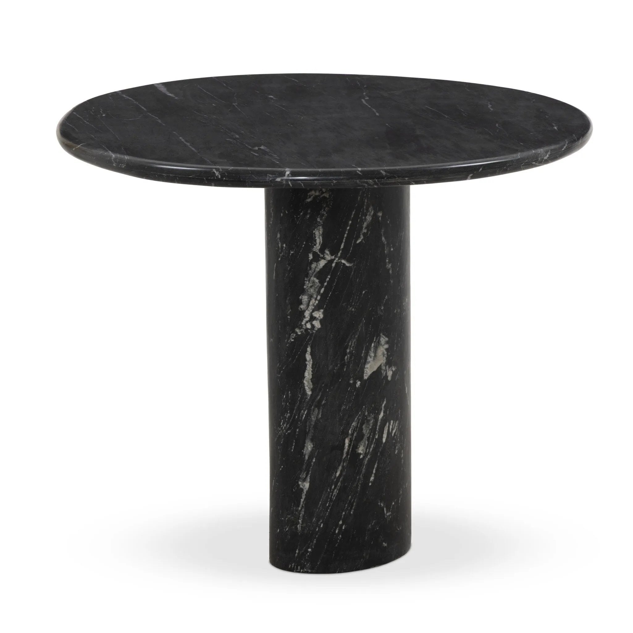 A material-driven piece inspired by post-modernism. A subtly organic round tabletop pairs with a swooped, sculptural pedestal base. Made from black marble for a striking, timeless look, with contrasting white veining playing up this piece's curves.As enthusiasts of luxe aesthetics at Amethyst, we love the designer inspired Oric Bistro Table. Amethyst Home provides interior design, new home construction design consulting, vintage area rugs, and lighting in the Scottsdale metro area.